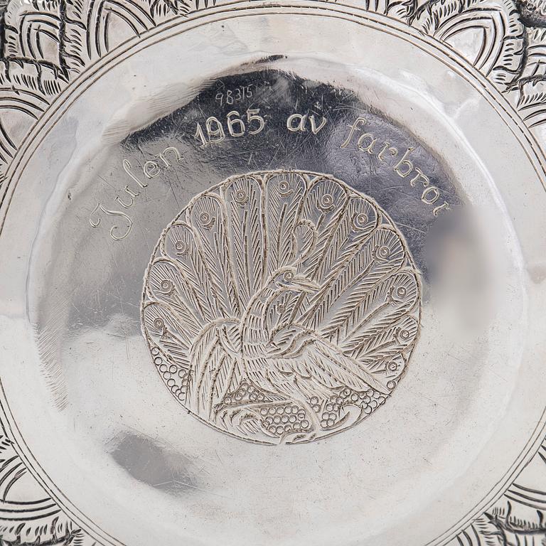 A silver repoussé bowl and jar, India, mid-20th century.