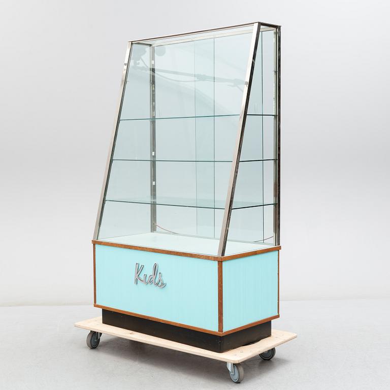 A second half of the 20th Century display cabinet for a shop.