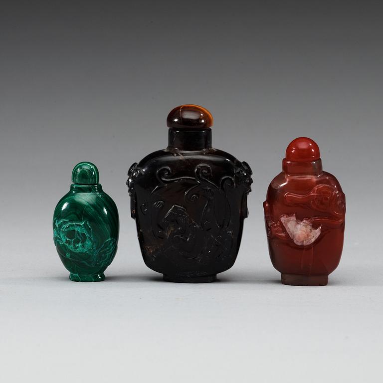 A set of three Chinese snuff bottles.