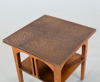 CARL CHRISTIAN CHRISTENSEN, a jugend smoking table, signed and dated 1910.