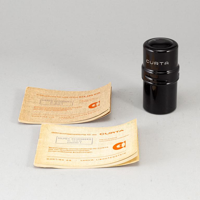 A 'Curta, Type I' calculator developed by Curt Herzstark, Contina AG Mauren, Lichtenstein, designed in 1947.