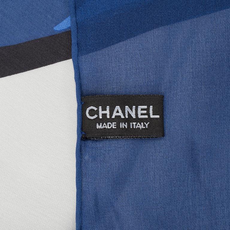 A silk scarf by Chanel.