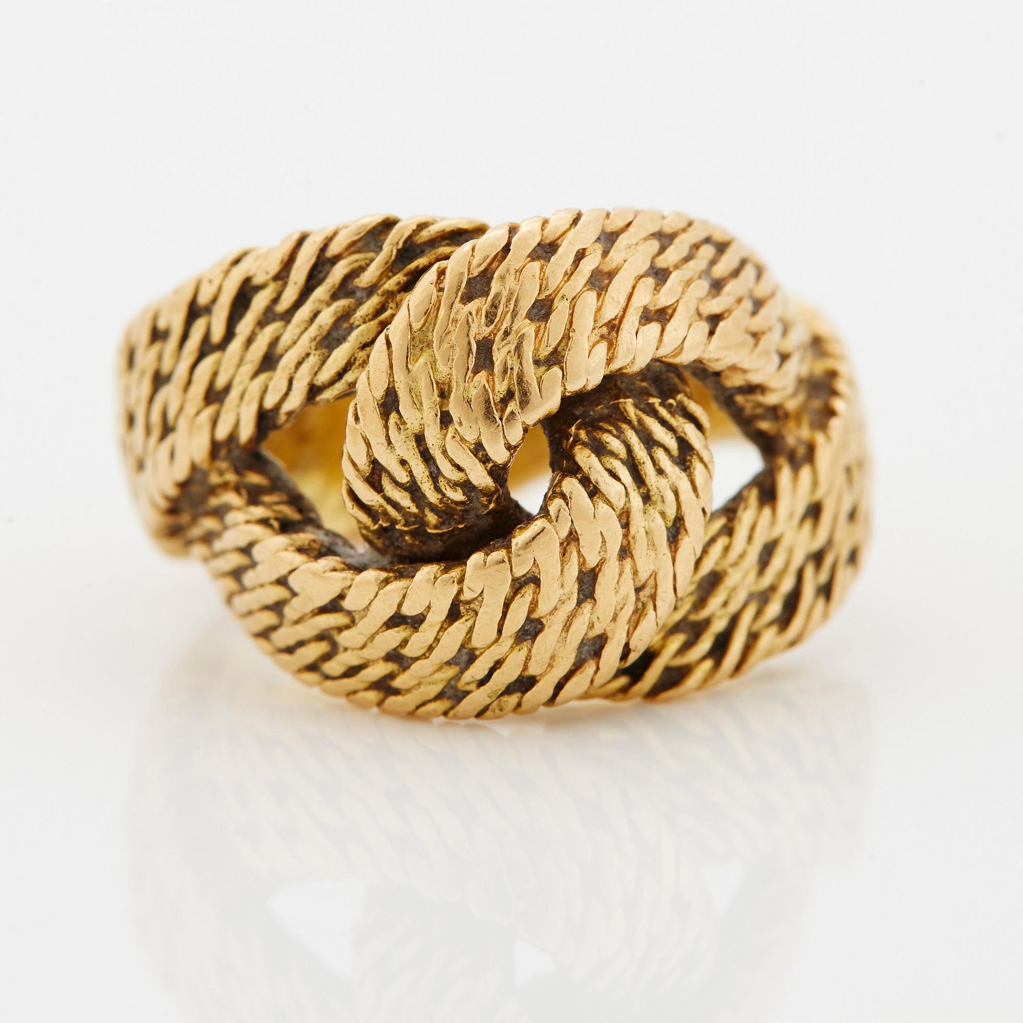 Georges L'Enfant an 18K gold demi parure comprising a necklace, a bracelet and a ring.