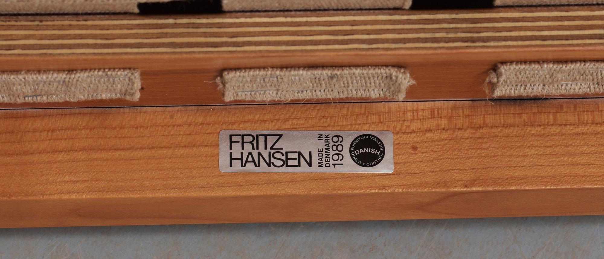 A pair of Hans J Wegner cherry and brown leather 'China chairs', Fritz Hansen, Denmark 1989.