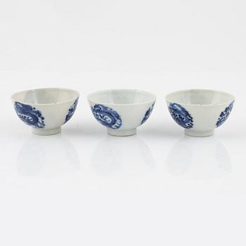 Six blue and white porcelain spoons and three cups, China, late Qing dynasty.