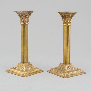 A pair of circa 1900 silver plated candle sticks.