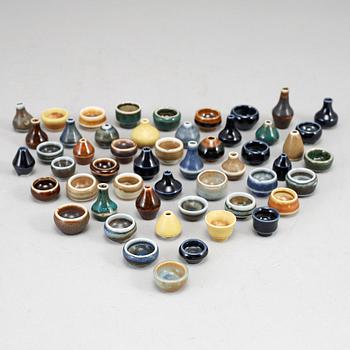 RÖRSTRAND, a set of 52 stoneware mini miniature vases and bowls.