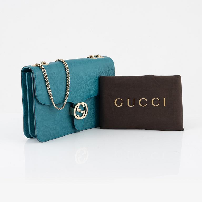 Gucci, a pebbled leather 'Interlocking G' bag.