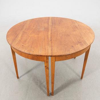 Dining table, turn of the 20th century.