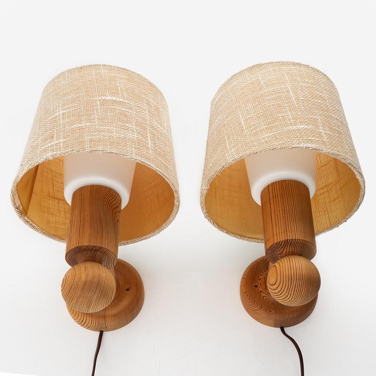 Uno & Östen Kristansson, a pair of pine wall lamps, Luxus, 1970s.