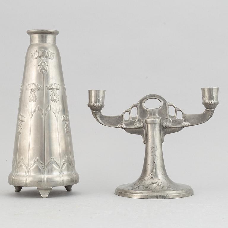 A Kayserzinn pewter vase and candelabrum, German, early 20th Century.