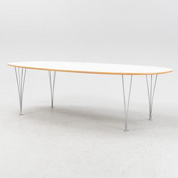 A Super ellpitical dining table, by Bruno Mathsson and Piet Hein for Fritz Hansen dated 2008.