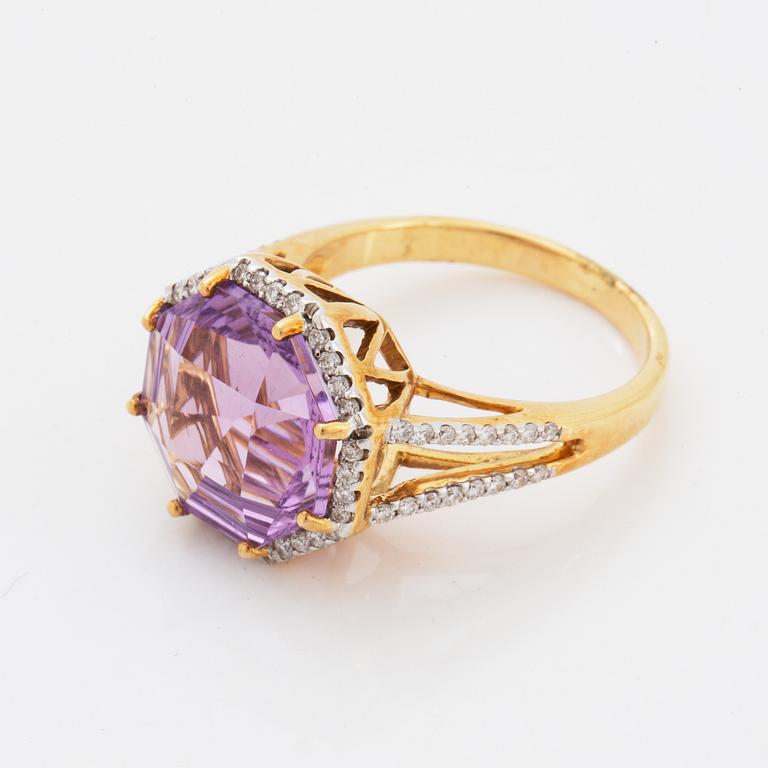 An amethyst ring.
