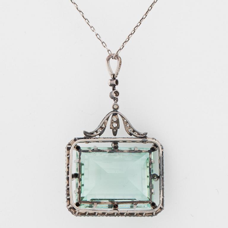 A circa 37.00 ct aquamarine and rose- and old-cut diamond pendant.