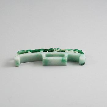 A Chinese carved jadeite belthook, 20th Century.