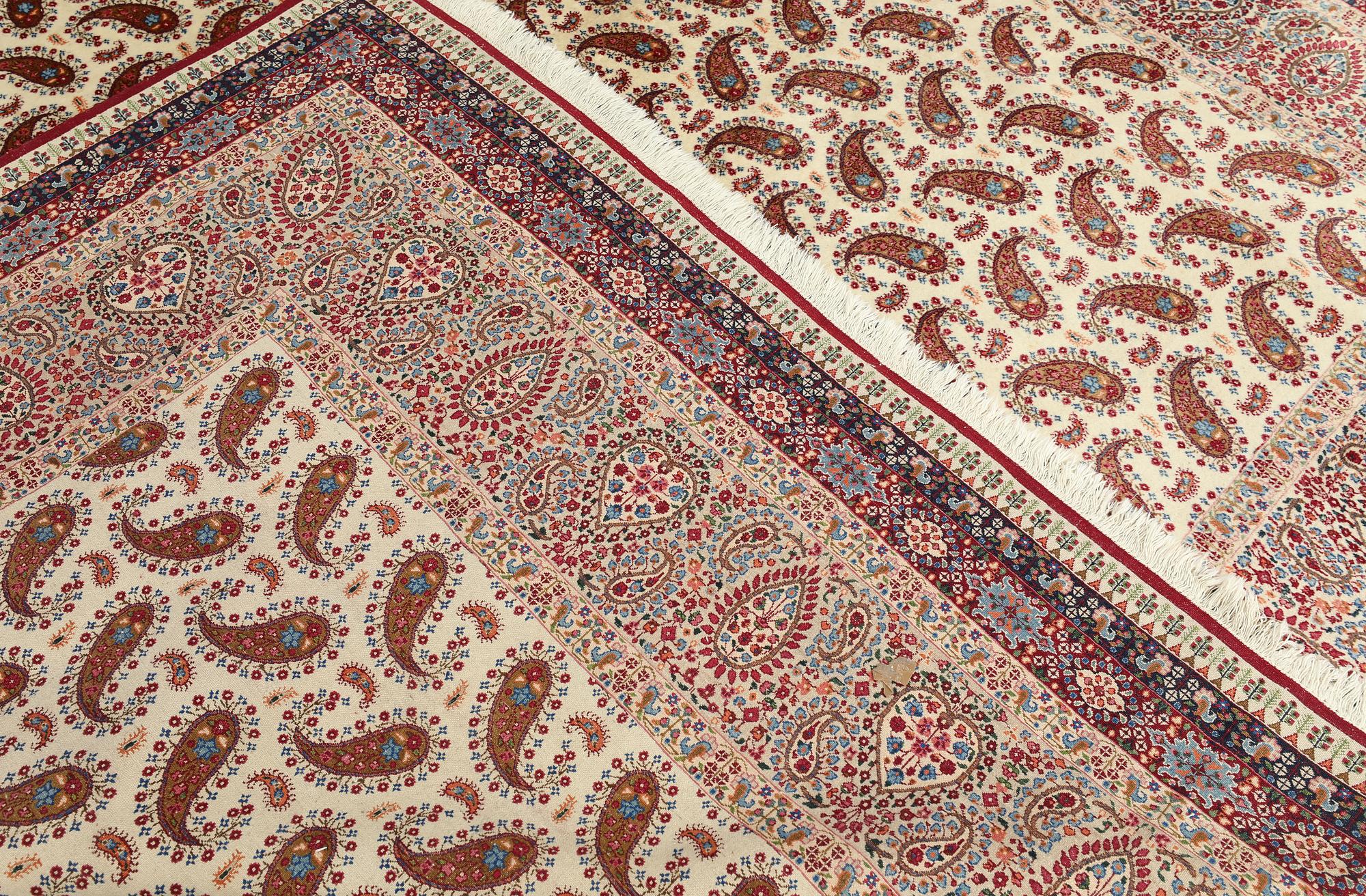 A Kirman carpet, signed, c. 390 x 295 cm.
