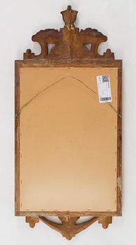 An early 20th century gustavian style mirror.