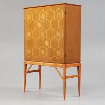 A Swedish Modern mahogany and birch cabinet attributed to Sven-Erik Skawonius, Stockholm 1940-50's.