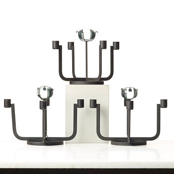 Gunnar Ander, a set of three iron and glass candlesticks for Ystad Metall, Sweden, mid 20th century.