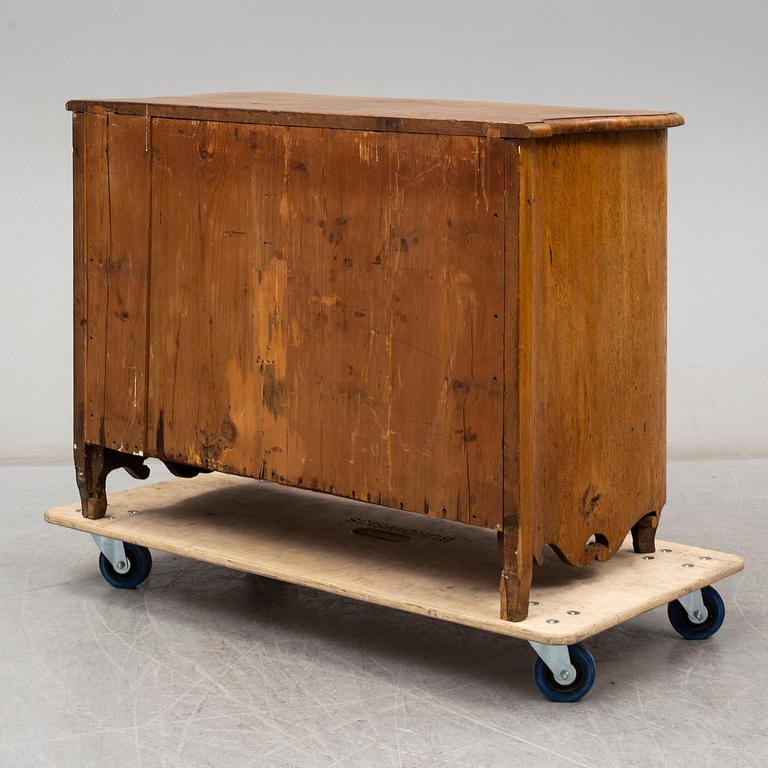 A 18th century rococo chest of drawers.