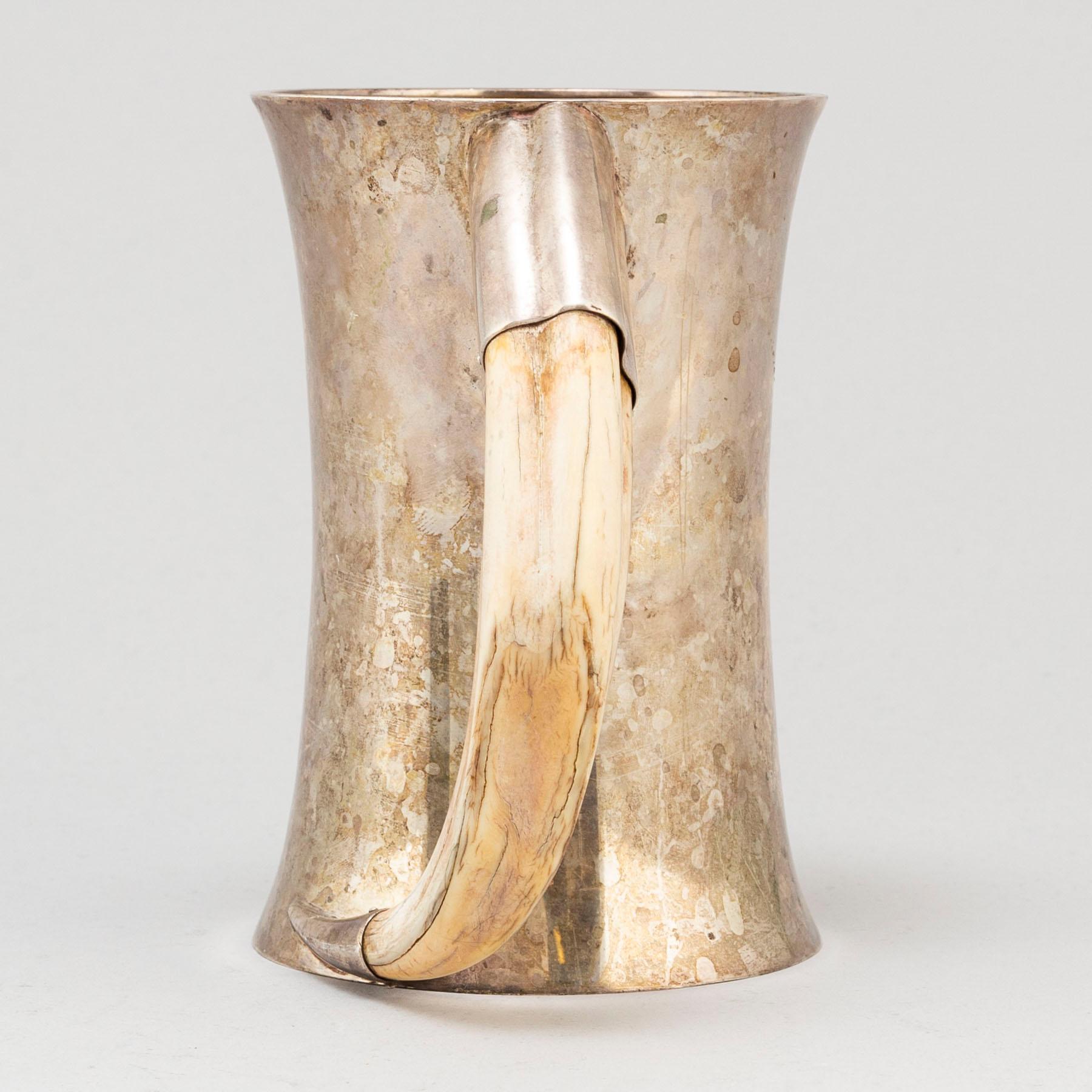A silver jug made by Axel Bergman, Stockholm in 1904.