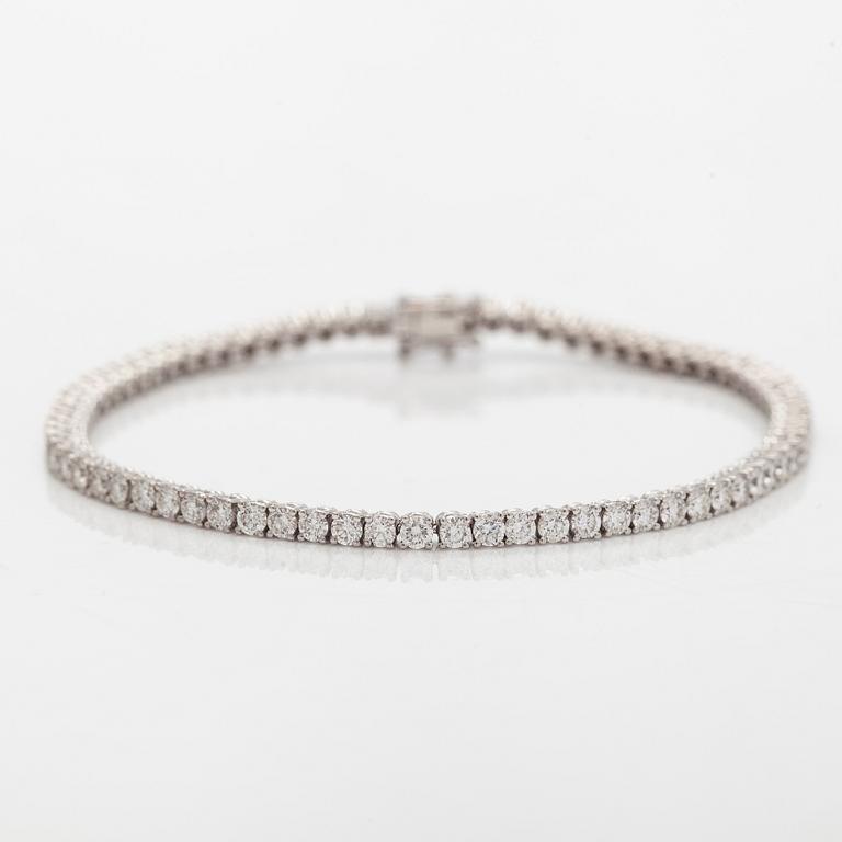 Tennis bracelet, brilliant-cut diamonds, 18K white gold.