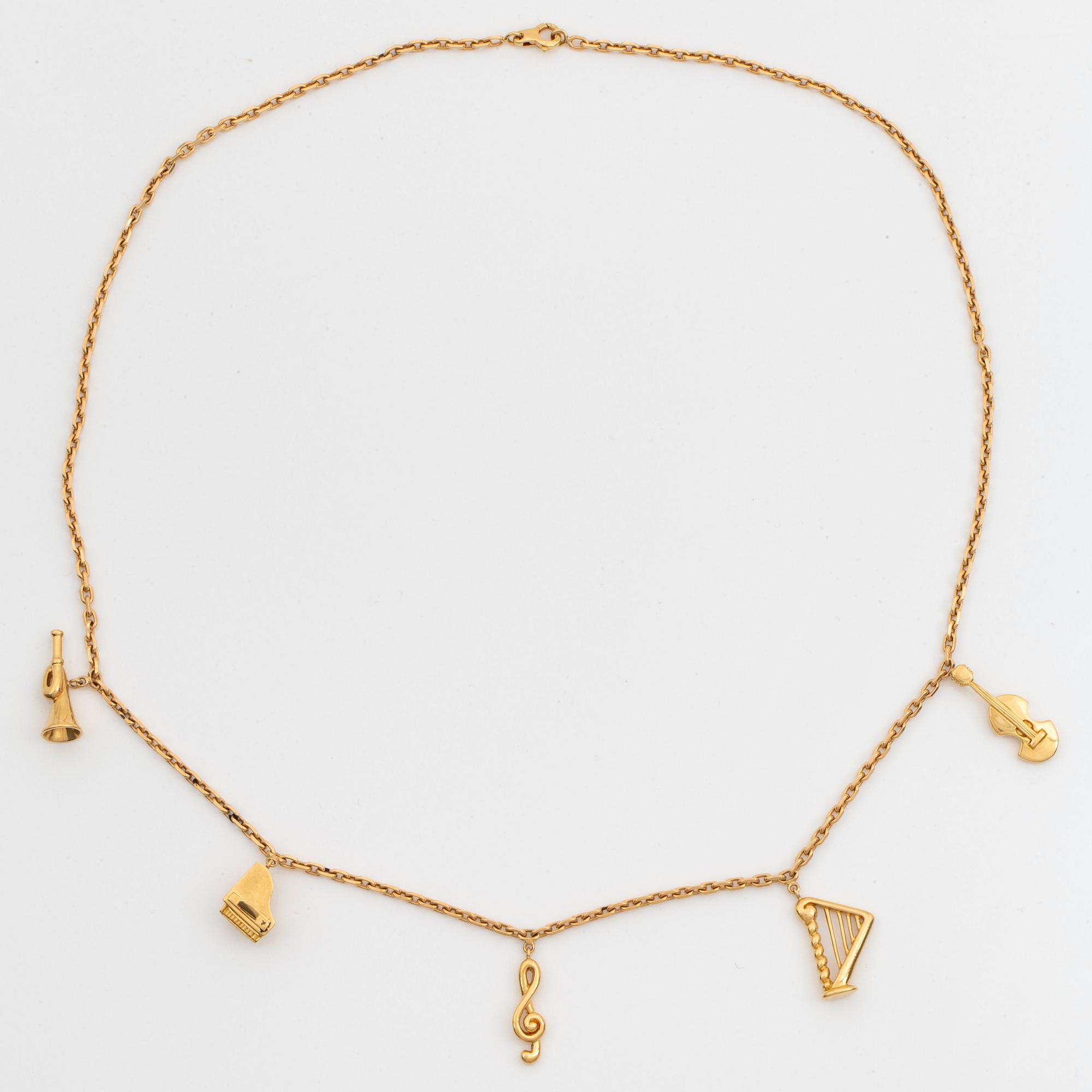 Dior halsband med berlocker 18K guld.