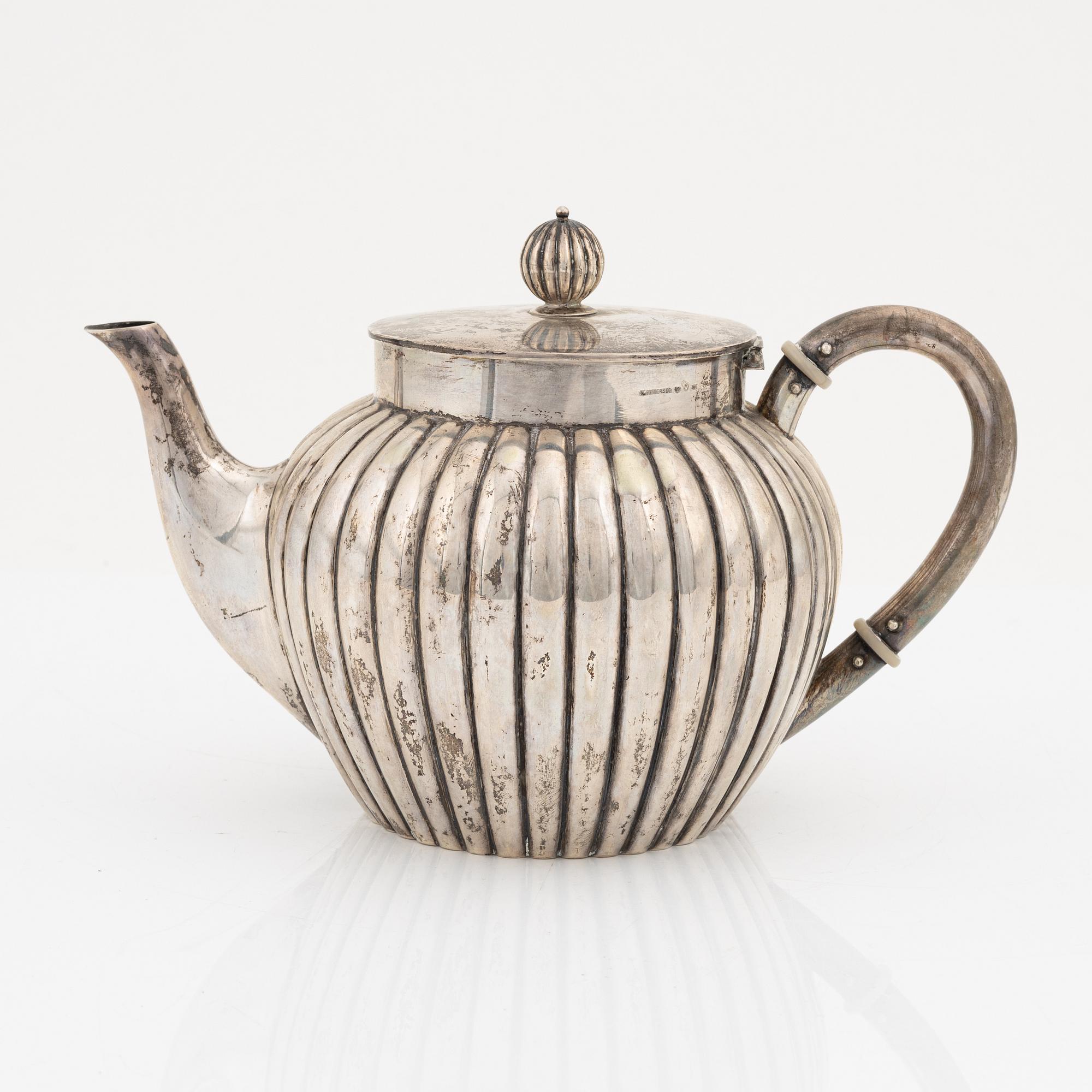 A silver teapot, bearing the mark of K. Andersson, Stcokholm, 1905.