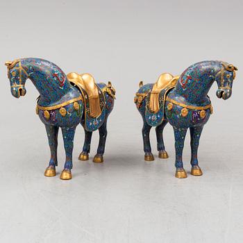 A pair of Chinese cloissoné horses, 20th Century.