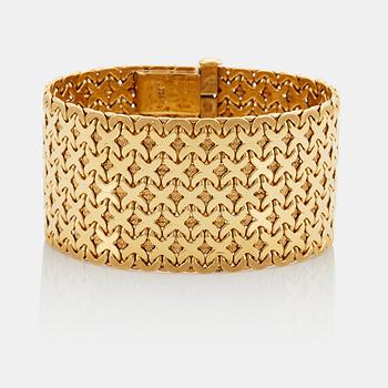 957. An 18K gold Tännler bracelet.