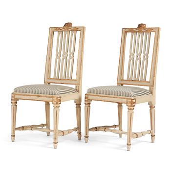 88. A pair of carved Gustavian chairs by J. Hammarström (master 1794-1812).