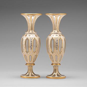 250. A pair of cut and gilded glass vases, 19th Century, possibly Russian.