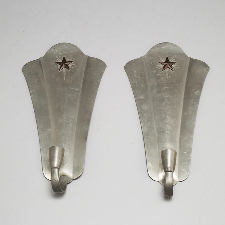 GAB, a pair of pewter wall sconces, 1932.