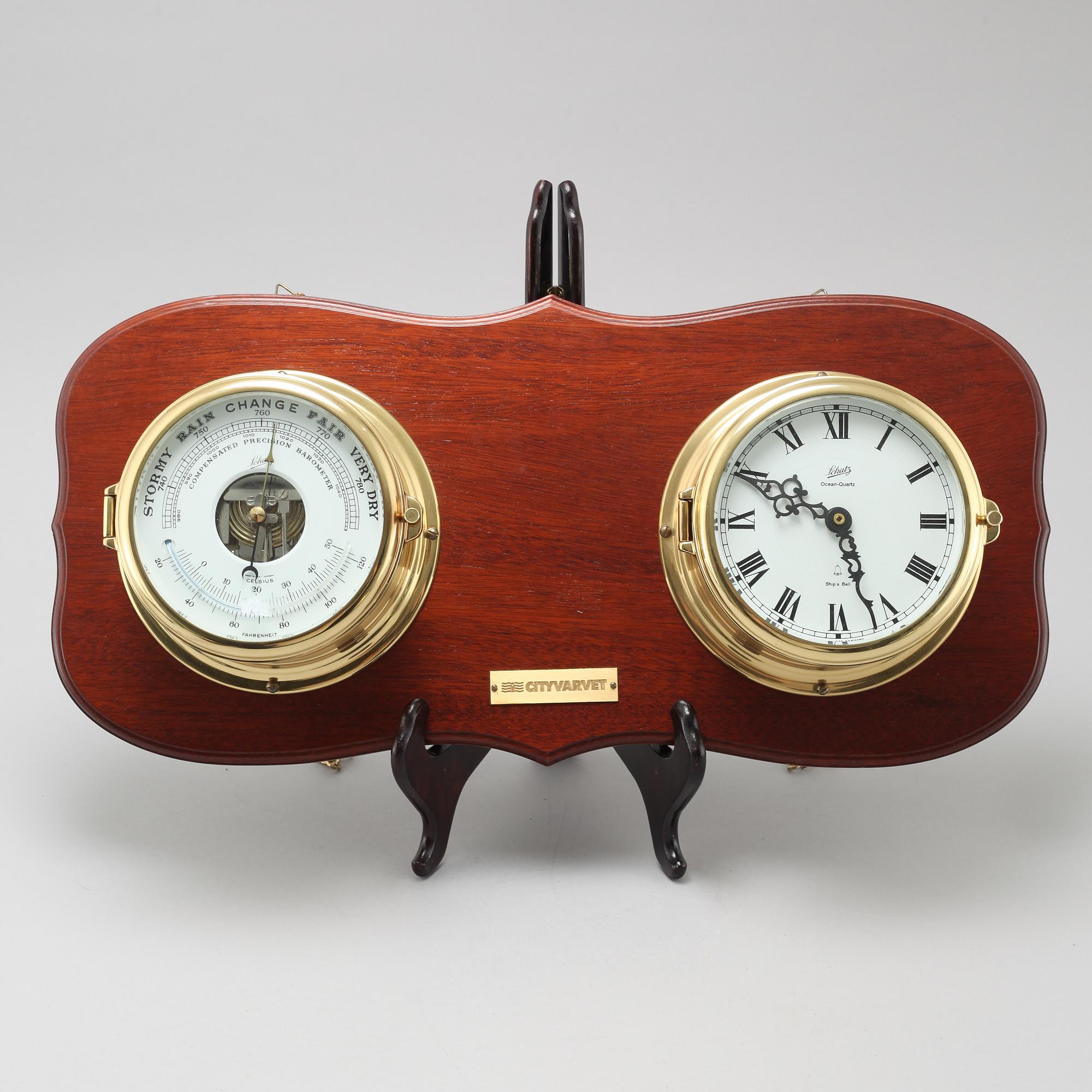 A wall clock and a barometer from Schatz.