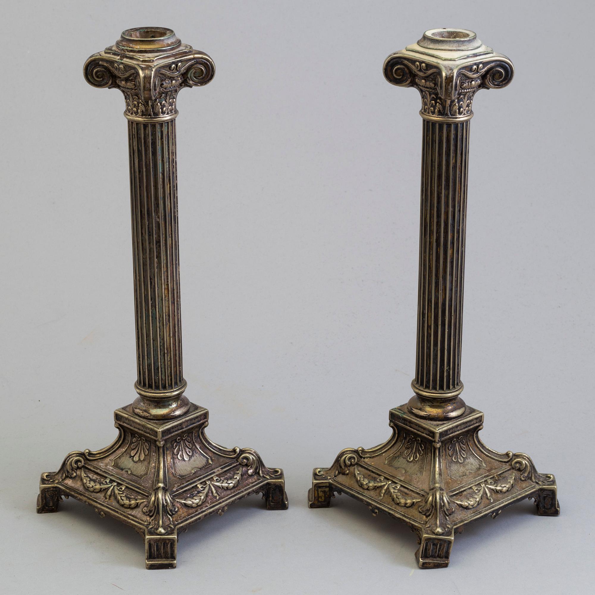 A pair of plated candel sticks from the fist half of the 20th century.
