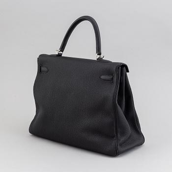 Hermès, a 'Kelly 35' black leather bag, 2017.