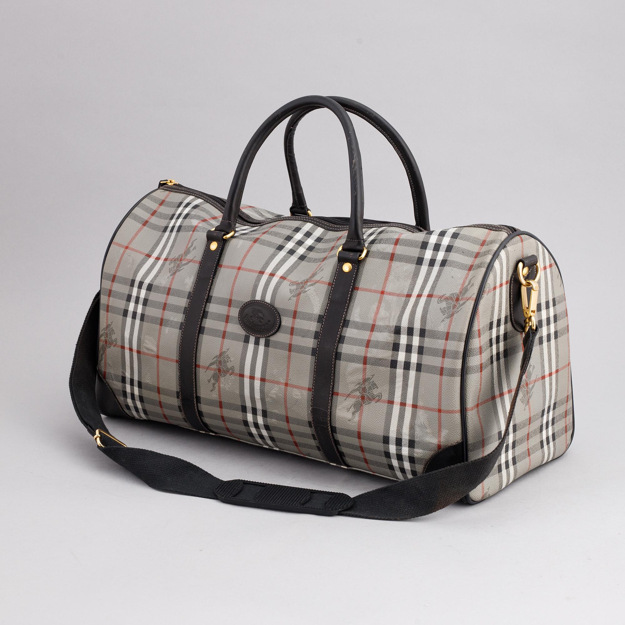 Burberry, a canvas weekend bag.