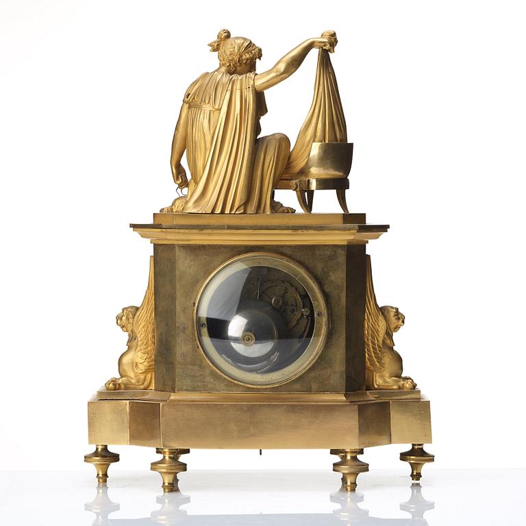 A Empire early 19th century gilt bronze mantel clock.