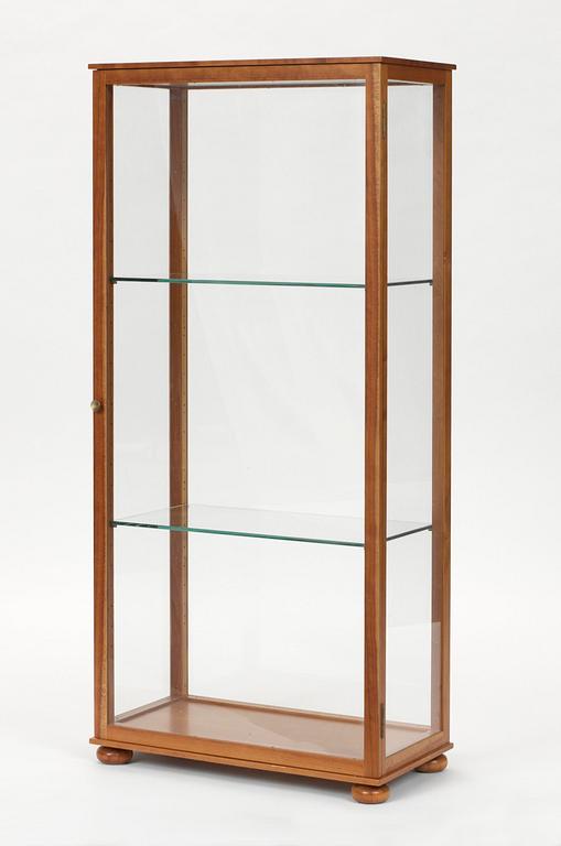 A Josef Frank cherry wood and glass cabinet, Firma Svenskt Tenn, model 649.