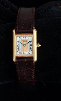 Cartier · ARMBANDSUR, dam, Cartier, Tank, de Must, förgyllt silver, quartz, ca 1988.