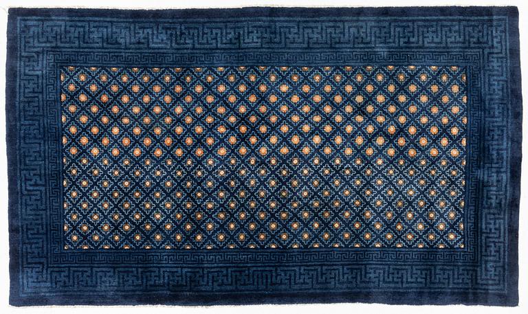 A semi-antique chinese Baotou rug, c 285 x 164 cm.