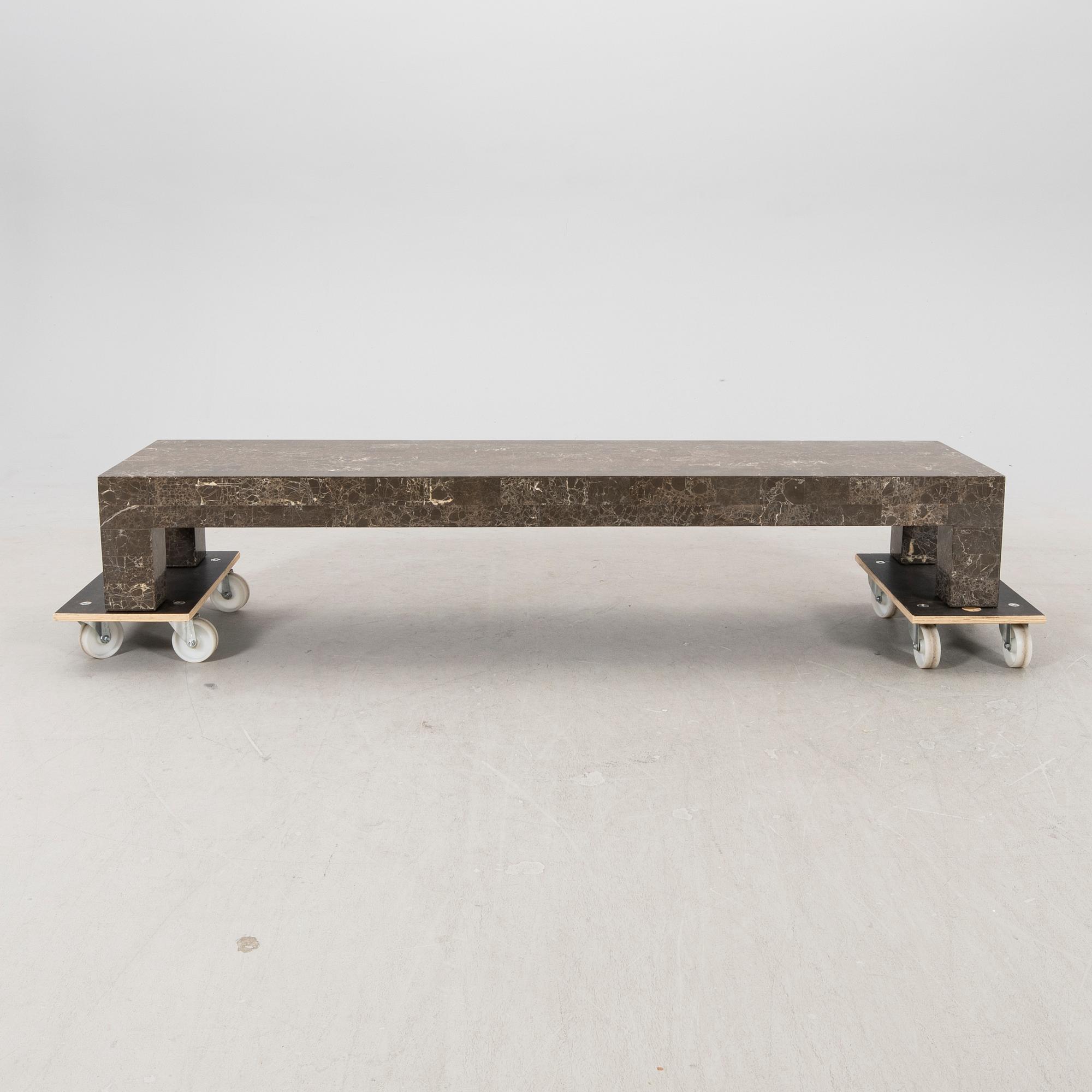 A late 20th century/21 st century travertin coffee table/sideboard.