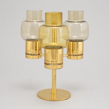 Hans-Agne Jakobsson, a modell L67 brass and glass three-light candelabra from Markaryd.