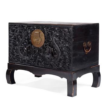 1120. A massive 'five clawed dragon' hardwood storage chest, Qing dynasty, 19th century.