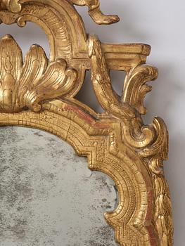 A Trasitional giltwood mirror by J. Åkerblad (master in Stockholm 1758-99).