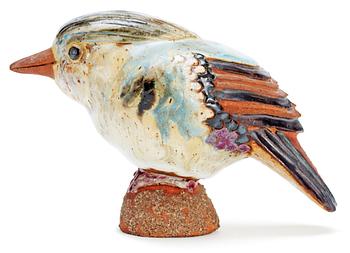 547. A Tyra Lundgren stoneware bird, signed with a seal.
