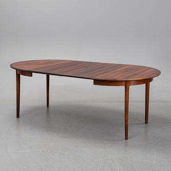 A seven-piece rosewood dining suite, 1960's/70's.
