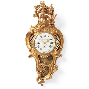 A French Louis XV ormolu cartel clock marked Baudin à Paris, mid 18th century.