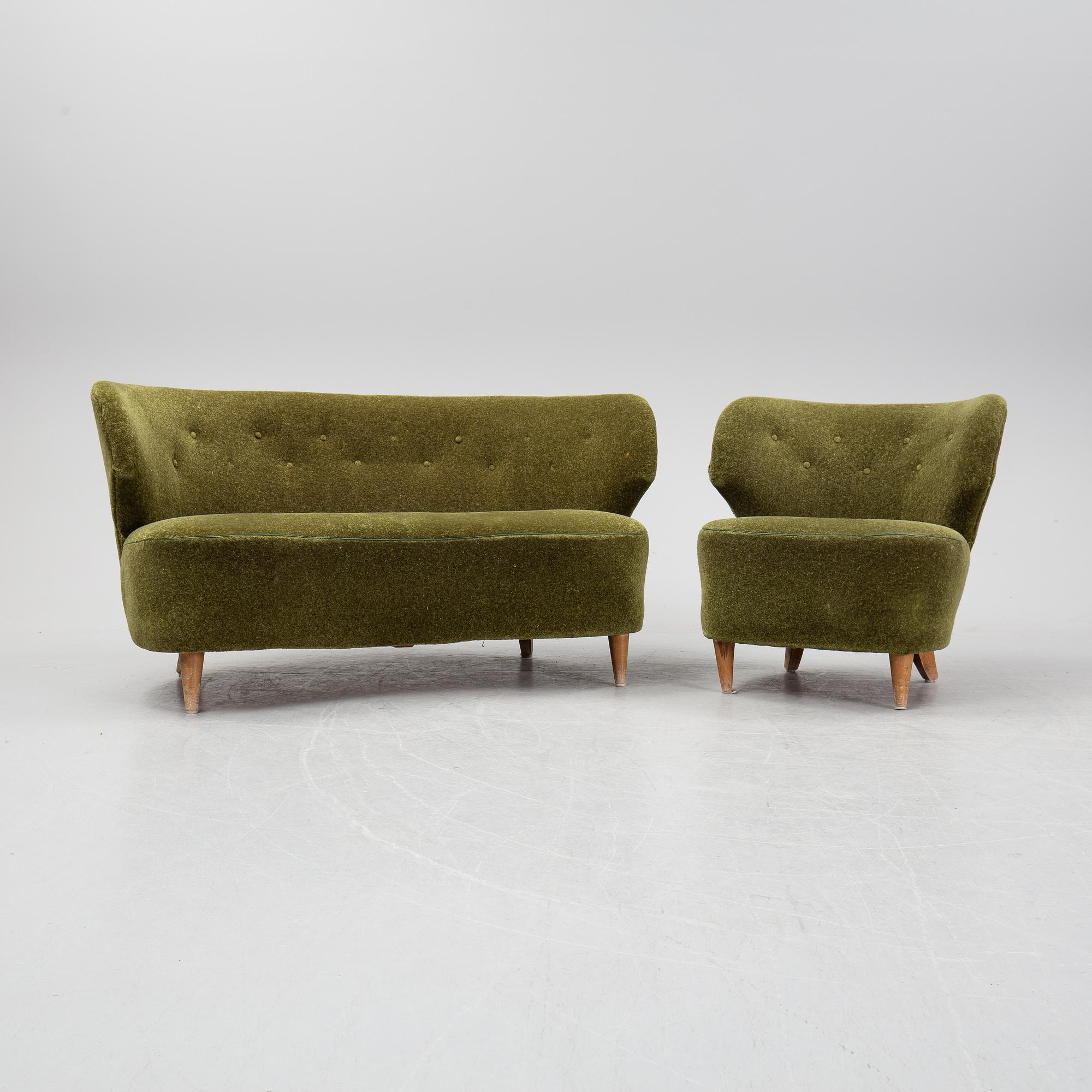 A sofa and easy chair, 1940s/50's.