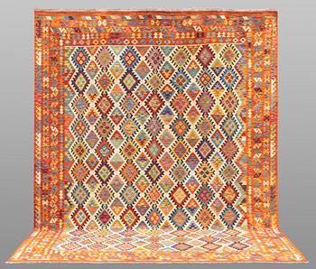 A carpet, Kilim, ca 388 x 309 cm.
